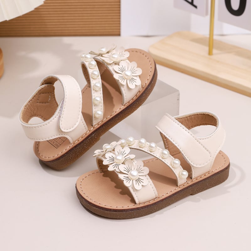 Meiteņu sandales 2025. gada vasaras jaunās ziedu dāmu princeses stila mīkstās zoles modernās saldās princeses kurpes