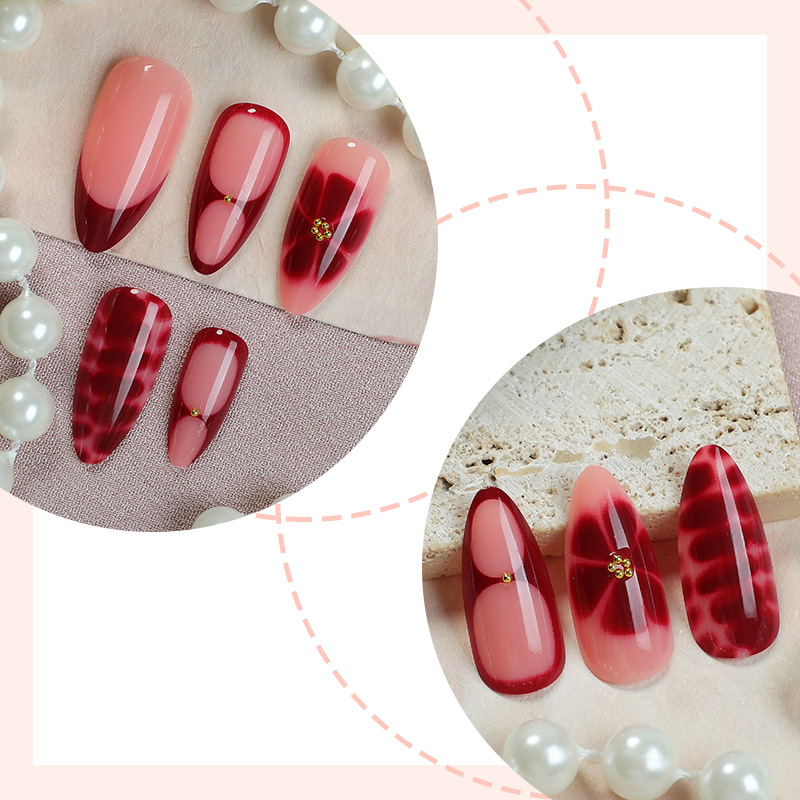 Eiropā un Amerikā pieprasīti marmora un Amerikas stila sprakšķu piespraužamie nagi, vidēji īsi mandeļu stila mākslīgie nagi, 3D ziedu stila piespraužamie nagi vairumtirdzniecībā