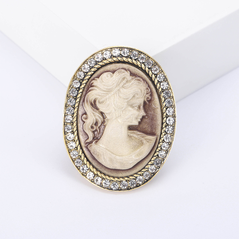 Europietiškos ir amerikietiškos mados kūrybinga nauja retro grožio galvos serijos sagė, lydinio deimantinė karalienės galvos portreto personalizuota sagė