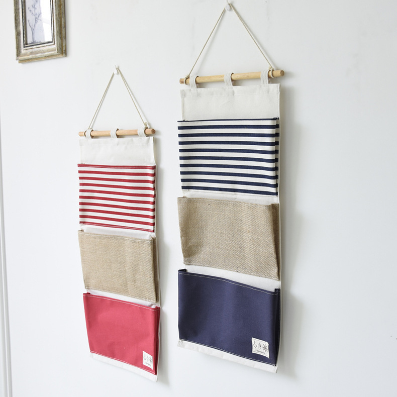 Autentiškas „Nautica“ stiliaus daugiafunkcis sujungiamas pakabinamas krepšys su 3 kišenėmis, sieninis daiktadėžės laikiklis su mediniu pagaliuku, audinio pakabinamas krepšys
