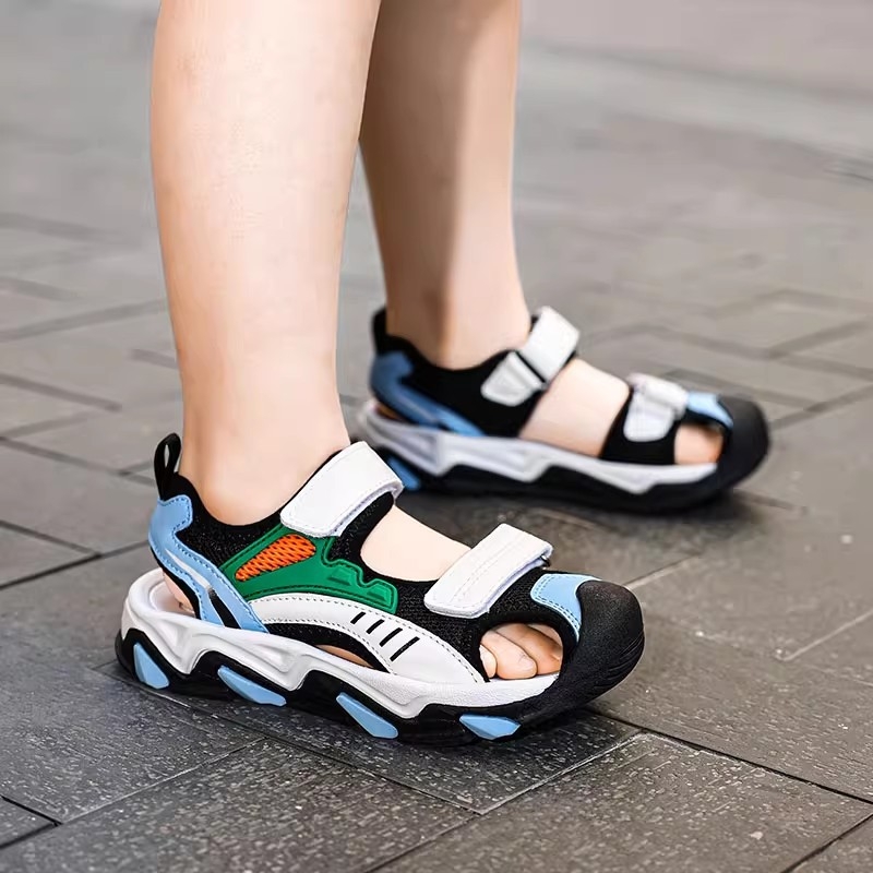 Pārrobežu bērnu sandales ar Velcro aizdari zēniem, jaunas vasaras Baotou mīkstās zoles zēnu sporta pludmales apavi, lieli bērnu apavi