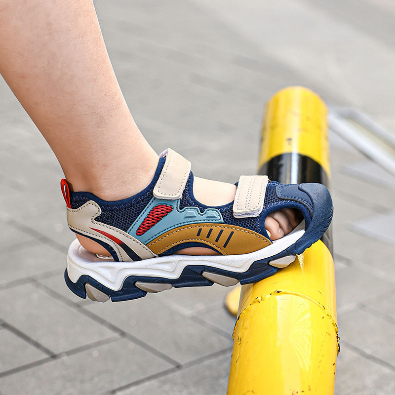 Pārrobežu bērnu sandales ar Velcro aizdari zēniem, jaunas vasaras Baotou mīkstās zoles zēnu sporta pludmales apavi, lieli bērnu apavi