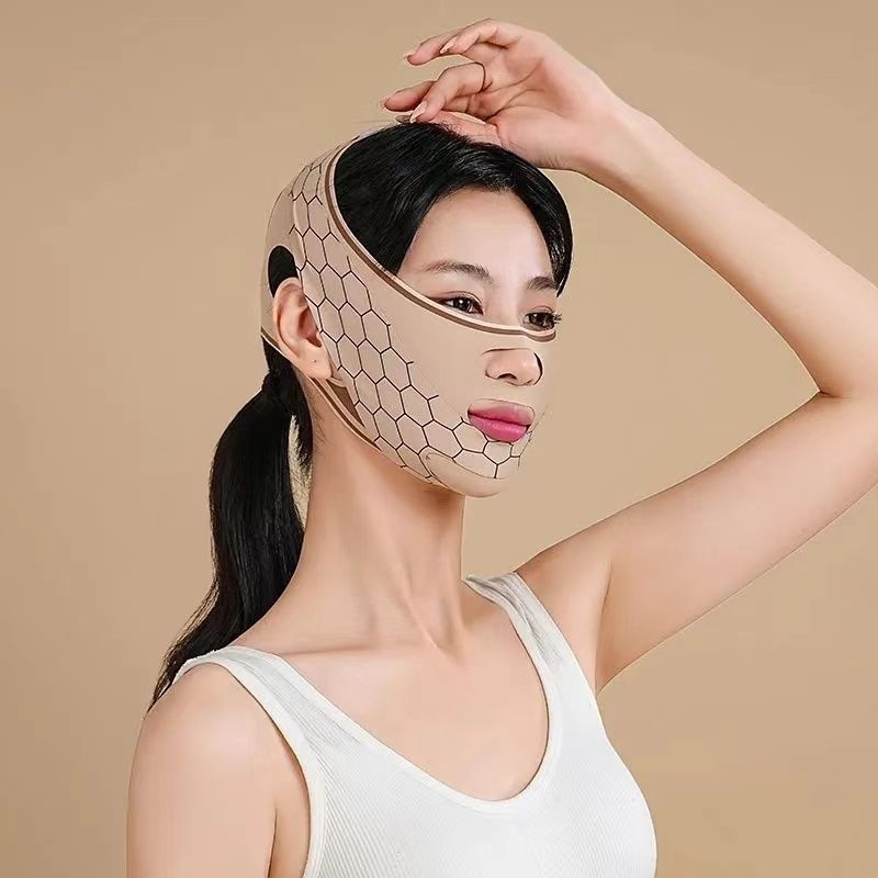 Piiriülene näo tõstmise ja pinguldamise artefaktiga näo vormiv side V-kujuline näo lõtvumisvastane pinna nikerdusmeetod mustriga unemask õmblusteta