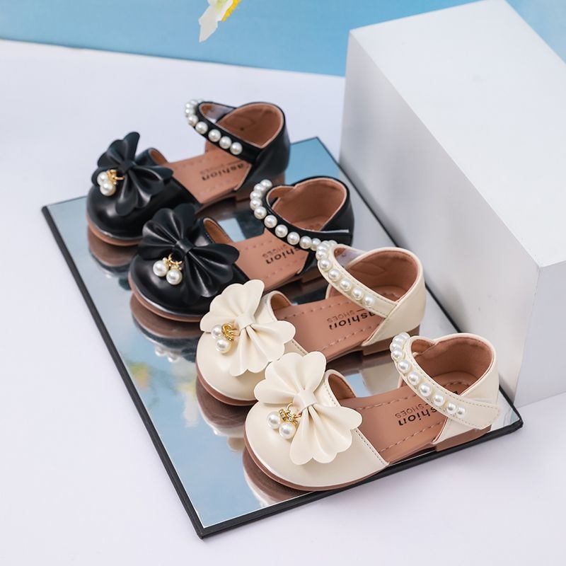 Meiteņu sandales 2025. gada jaunās pavasara un vasaras vidēja izmēra bērnu mīkstās zoles mazuļu princeses apavi bērnu bantītes meiteņu vasaras apavi