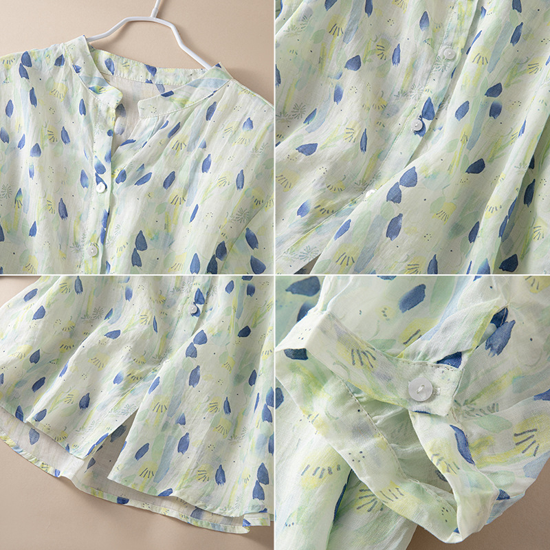 Moteriški 2024 m. vasaros laisvo kirpimo V formos iškirptės gėlėti ramės marškiniai su vidutinėmis rankovėmis.