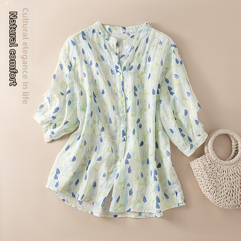 Moteriški 2024 m. vasaros laisvo kirpimo V formos iškirptės gėlėti ramės marškiniai su vidutinėmis rankovėmis.