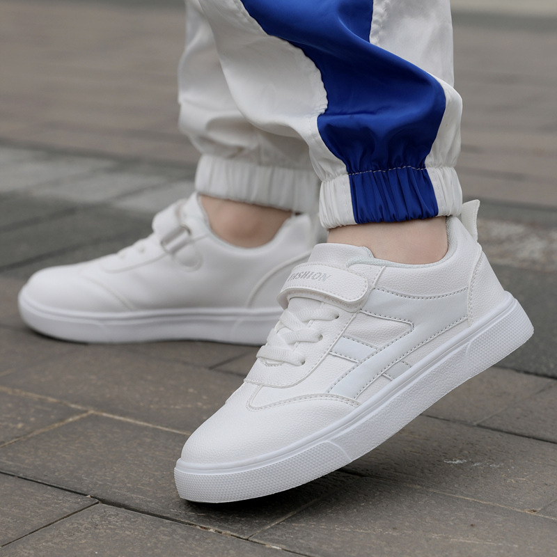 Bērnu dēļu apavi pavasara un rudens ādas sejas meitenēm baltas kurpes ar zemu augšdaļu skolas snieguma zēniem baltas kurpes ikdienas apavi