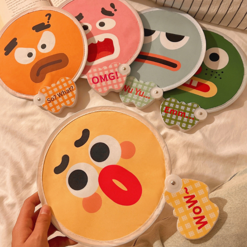 Koomiksist kahepoolne väljendusventilaator, suvine kokkupandav väike ventilaator, armas käeshoitav väike ventilaator, väike ümmargune ventilaator lastele ja õpilastele