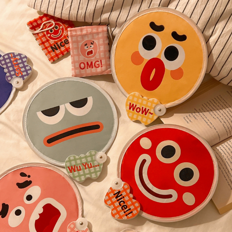 Koomiksist kahepoolne väljendusventilaator, suvine kokkupandav väike ventilaator, armas käeshoitav väike ventilaator, väike ümmargune ventilaator lastele ja õpilastele