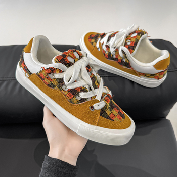 Vīriešu augstas kvalitātes jauni melnbalti pāris 2025 audekla nišas unisex dizaina ielāpu skrituļslidošanas apavi