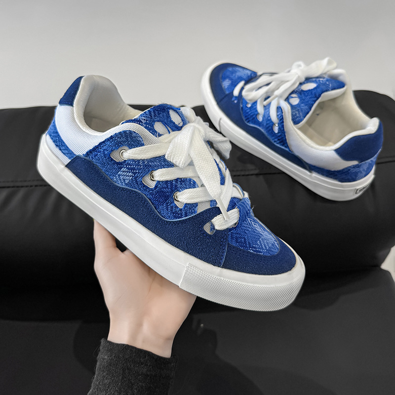 Vīriešu augstas kvalitātes jauni melnbalti pāris 2025 audekla nišas unisex dizaina ielāpu skrituļslidošanas apavi