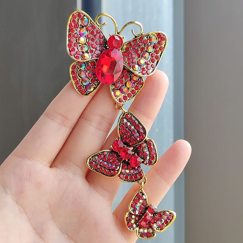Loominguline pikk liblikpross väikese ülikonnaga rhinestones retro putukanõel elegantne uhke tseremoonia banketisaali korsett