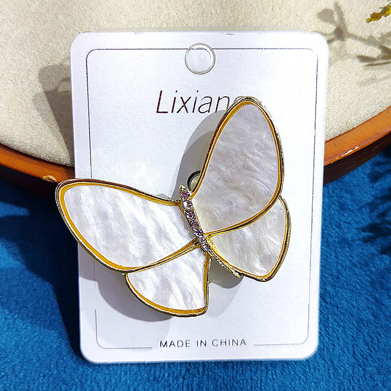 Европейски и американски луксозни игли за ревери, луксозни игли за пеперуди, копчета за жилетки, модерни стилни, елегантни корсажи, сладки производители на едро