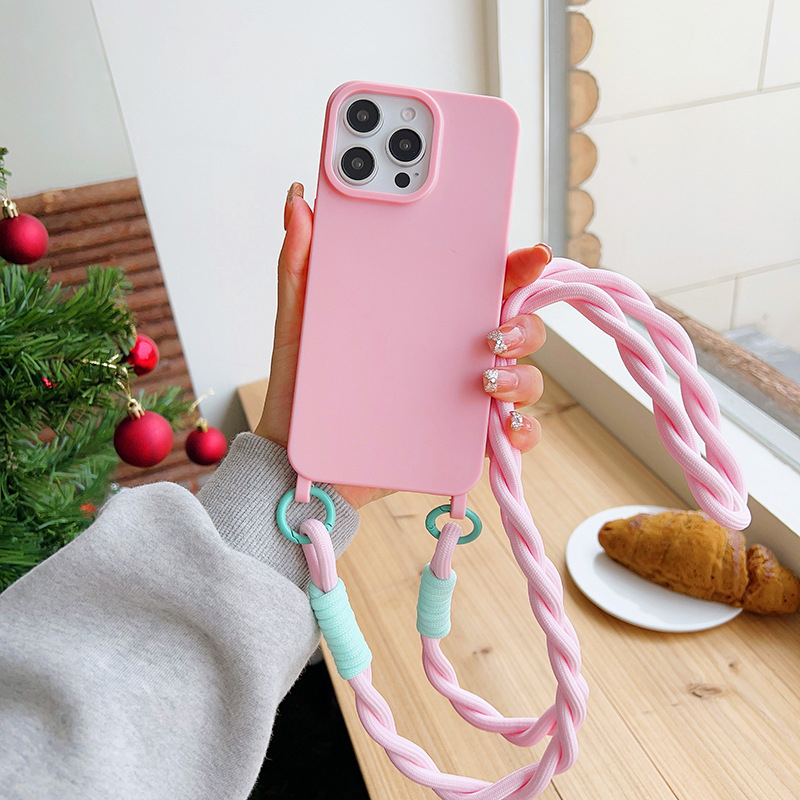 Lihtne ühevärviline telefoniümbris Apple Phone 15pro/14pro kaitseümbrisele koos keerdnööriga risti asetseva kaelarihmaga