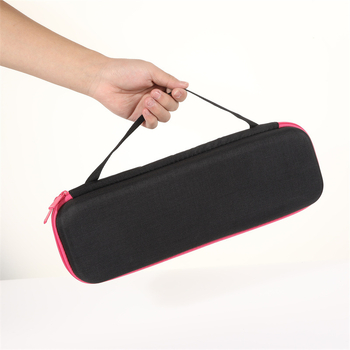 Dysoni fööni hoiukarp, juuksuritööriistade hoiukott, lokitangid, sirgendaja, kukkumisvastane kaitsekott laos.