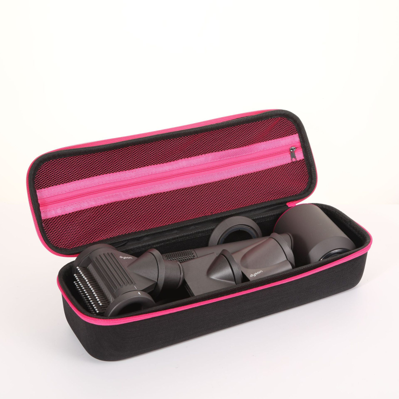 Dysoni fööni hoiukarp, juuksuritööriistade hoiukott, lokitangid, sirgendaja, kukkumisvastane kaitsekott laos.