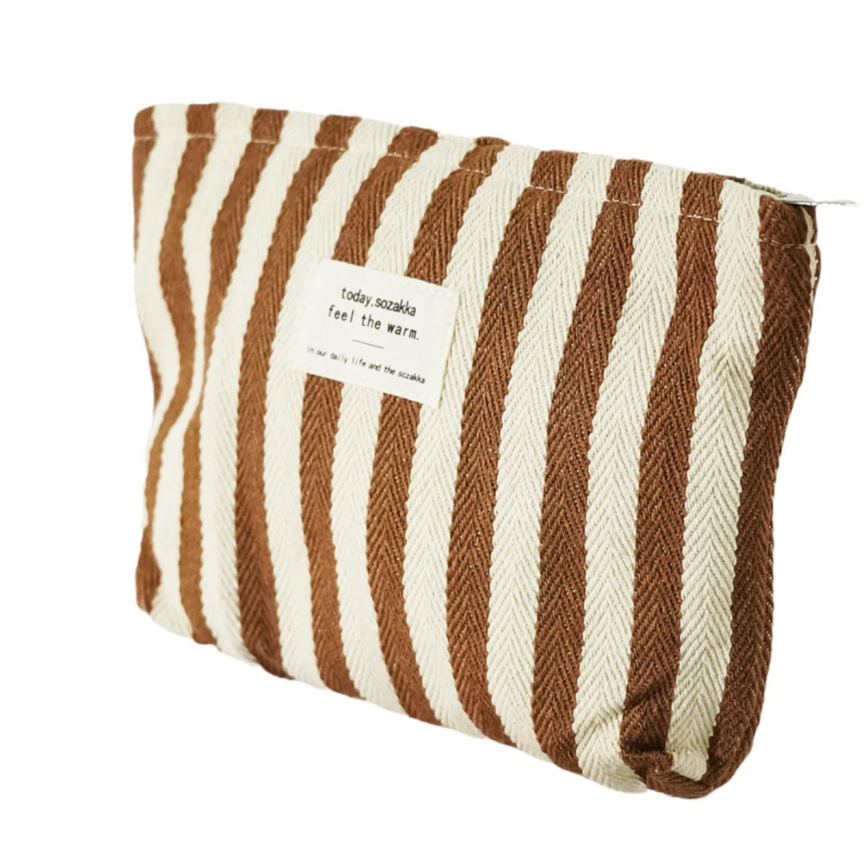 Beeži pagasi piiriülene hooldusteenus on spetsialiseerunud Xiyini tehase triibulisele kosmeetikakotile, mis on käsitsi hoitav suure mahutavusega pesemis- ja hoiustamiskott.