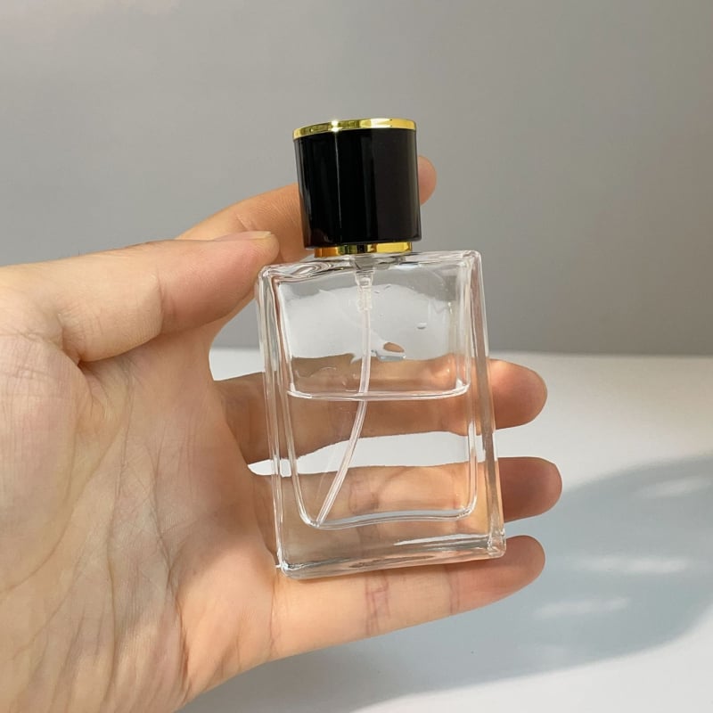 Parfüümipudel 30ml Stiilne kaasaskantav kosmeetiline klaaspudel Puidust kork Press Spray Läbipaistev parfüümipudel Tühi pudel