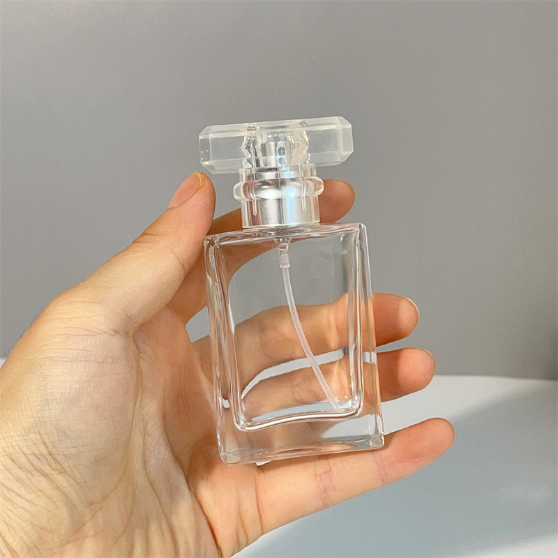 Parfüümipudel 30ml Stiilne kaasaskantav kosmeetiline klaaspudel Puidust kork Press Spray Läbipaistev parfüümipudel Tühi pudel
