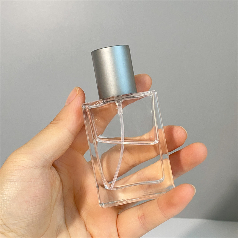 Parfüümipudel 30ml Stiilne kaasaskantav kosmeetiline klaaspudel Puidust kork Press Spray Läbipaistev parfüümipudel Tühi pudel