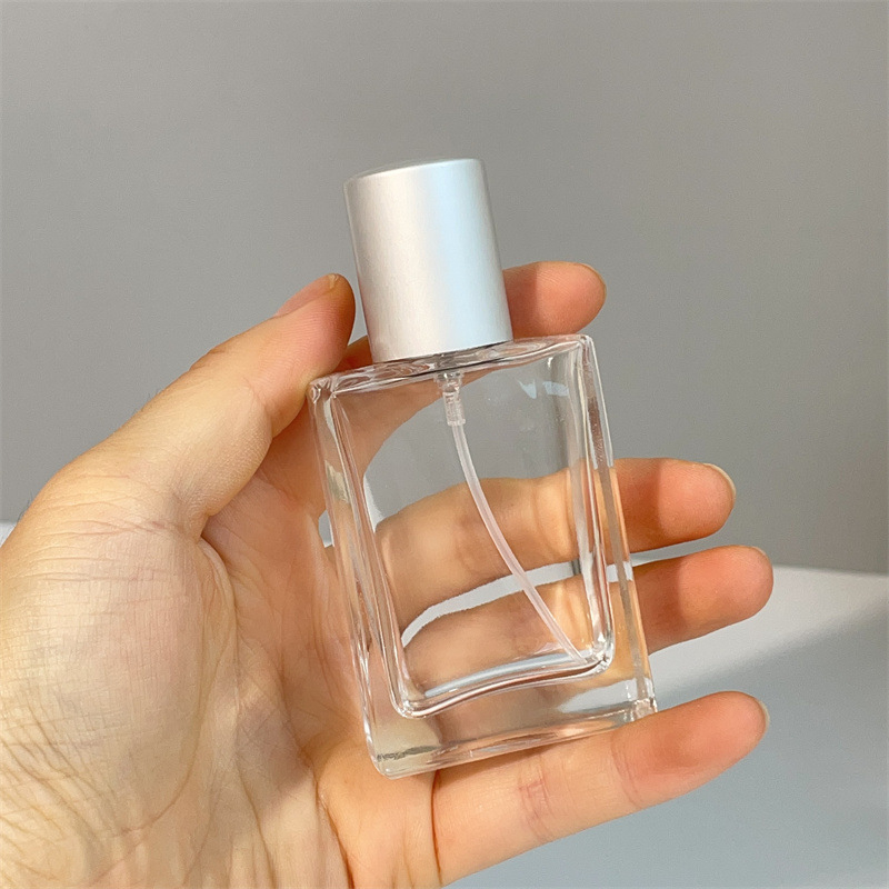 Parfüümipudel 30ml Stiilne kaasaskantav kosmeetiline klaaspudel Puidust kork Press Spray Läbipaistev parfüümipudel Tühi pudel
