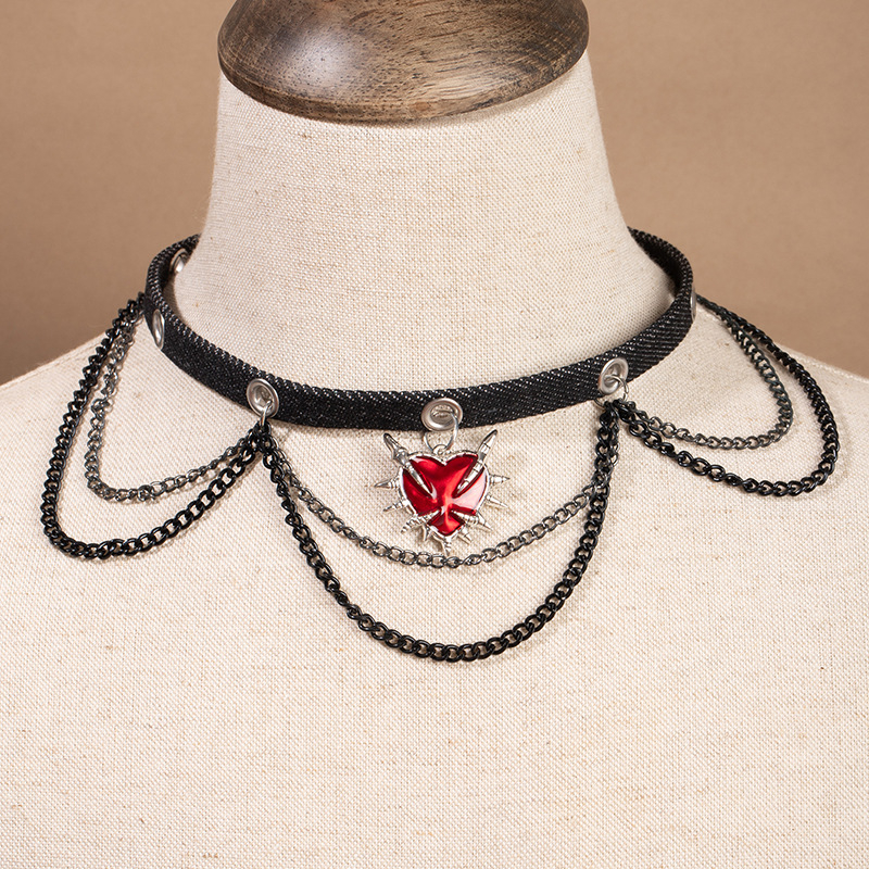 Euroopa ja Ameerika piiriülene südamekujulise ketiga nahast kaelakee, punk-hip-hop, tume stiilis rangluukett, niššiks olemise roki stiilis kaelakee