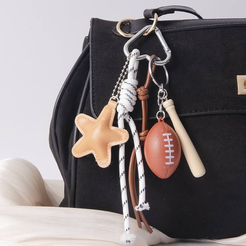 Piiriülene populaarne nahast viieharulise tähega Miu seeria koti ripats, pesapalli, ragbi tähega koti ripats, isetehtud võtmehoidja