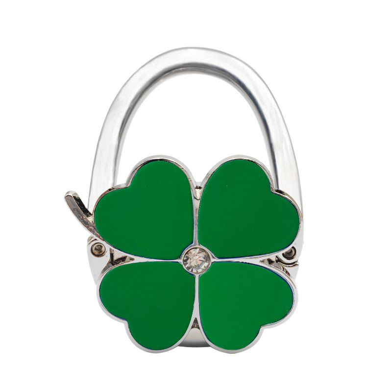 Loominguline õnneliku rohuga kokkupandav kotikonks, kaasaskantav neljaleheline ristik puhtast nahast laua küljeriputi naiste käekotikoti konks