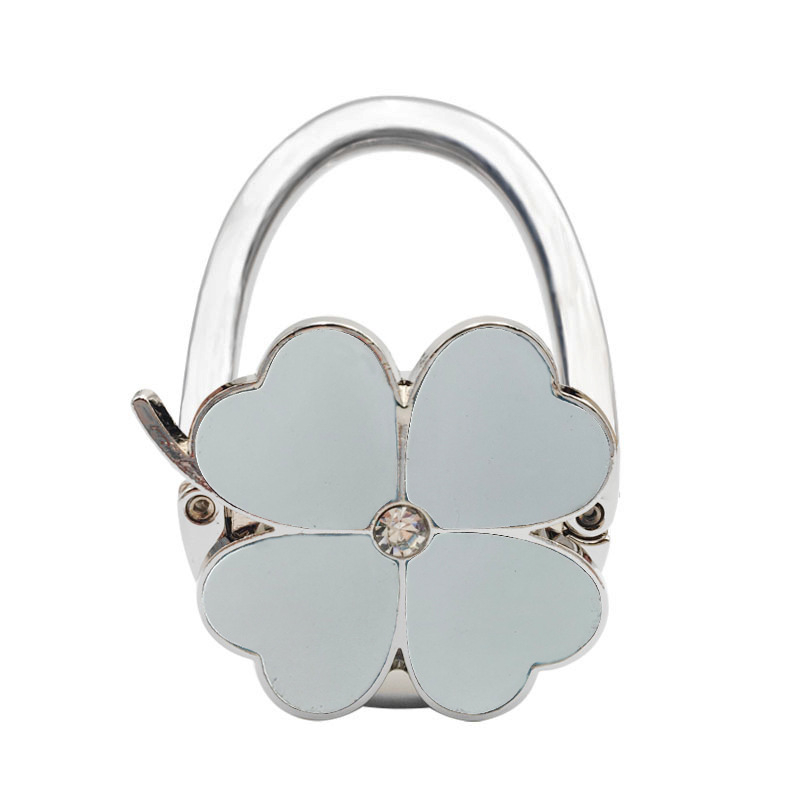 Loominguline õnneliku rohuga kokkupandav kotikonks, kaasaskantav neljaleheline ristik puhtast nahast laua küljeriputi naiste käekotikoti konks