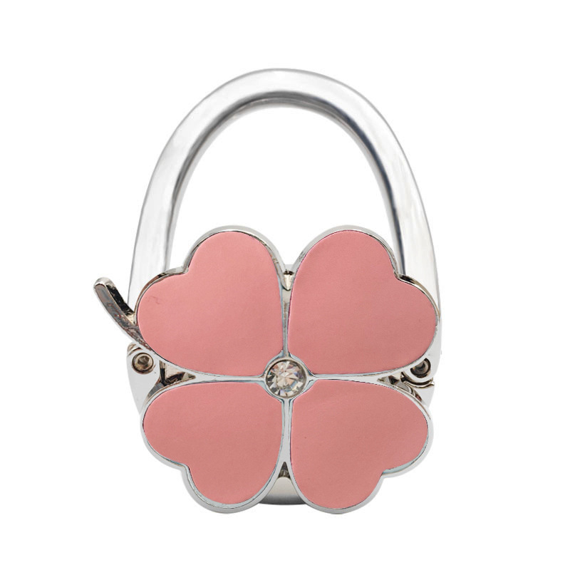 Loominguline õnneliku rohuga kokkupandav kotikonks, kaasaskantav neljaleheline ristik puhtast nahast laua küljeriputi naiste käekotikoti konks