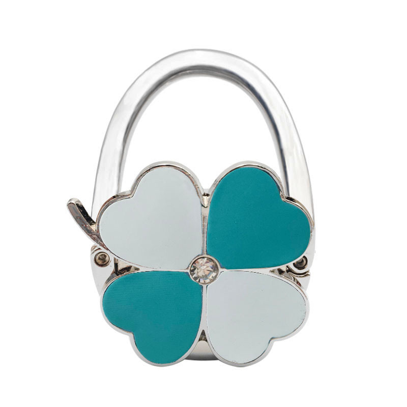 Loominguline õnneliku rohuga kokkupandav kotikonks, kaasaskantav neljaleheline ristik puhtast nahast laua küljeriputi naiste käekotikoti konks