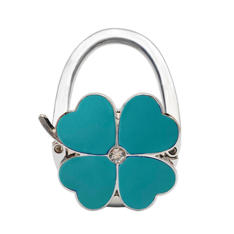 Loominguline õnneliku rohuga kokkupandav kotikonks, kaasaskantav neljaleheline ristik puhtast nahast laua küljeriputi naiste käekotikoti konks