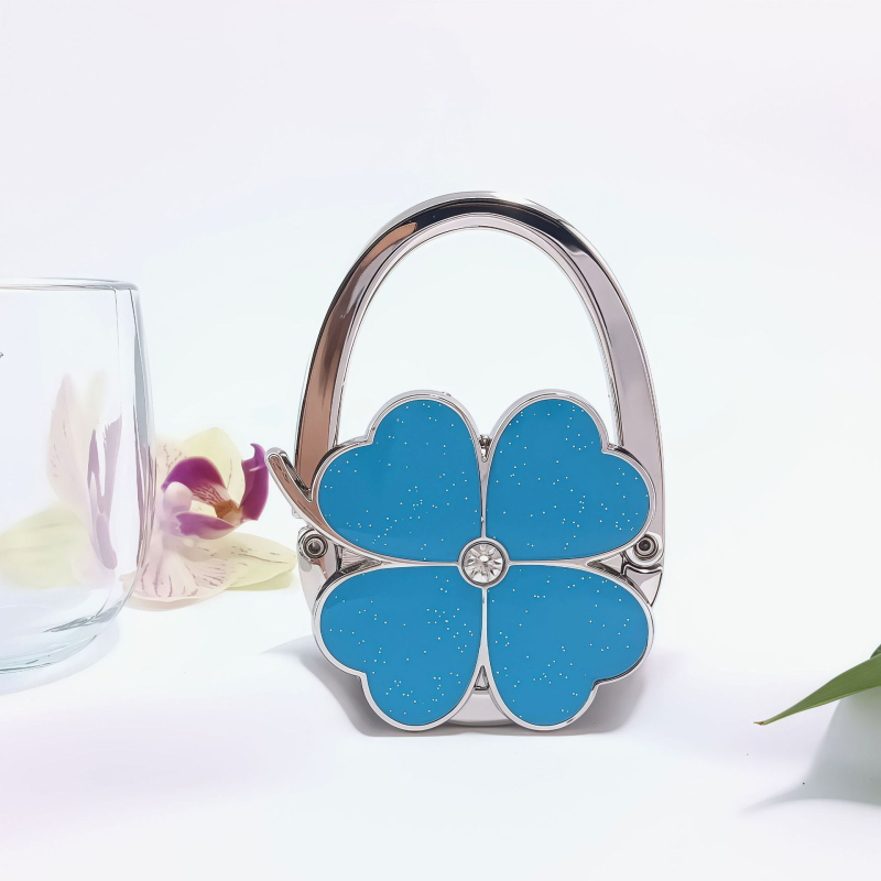 E-kaubanduse eksport Uute vidinate värvitud õlivärviga neljaleheline ristik ristik ümmargune brändi käekott konksuga käekoti rippuv