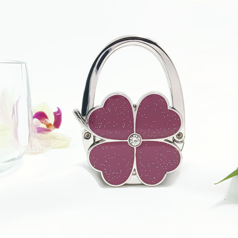 E-kaubanduse eksport Uute vidinate värvitud õlivärviga neljaleheline ristik ristik ümmargune brändi käekott konksuga käekoti rippuv