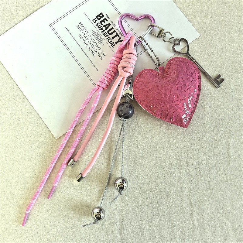 Piiriülene uue toote viieharuline tähekujuline kott-ripats autovõtmehoidja naistele mõeldud dopamiini ripats suveniiripael hulgimüük