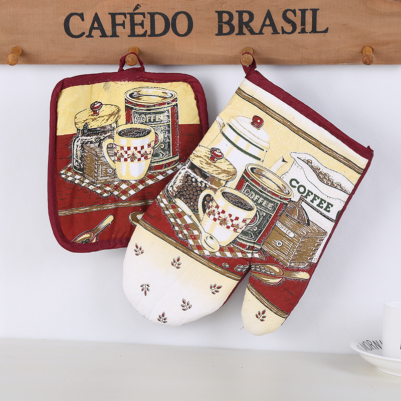 Tehase otsene polüester-puuvillane mikrolaineahju kaheosaline kõrge temperatuurikindel põletusvastane ahjukinnas laualina loominguline köögitarvik