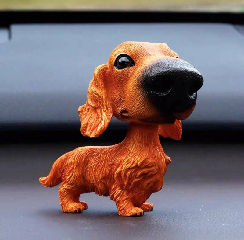 Piiriülesed bobblehead-koerakaunistused, loomingulised ja armsad autokaunistused, armsad koera- ja kassisimulatsiooninukud, maailmakuulsad koerad