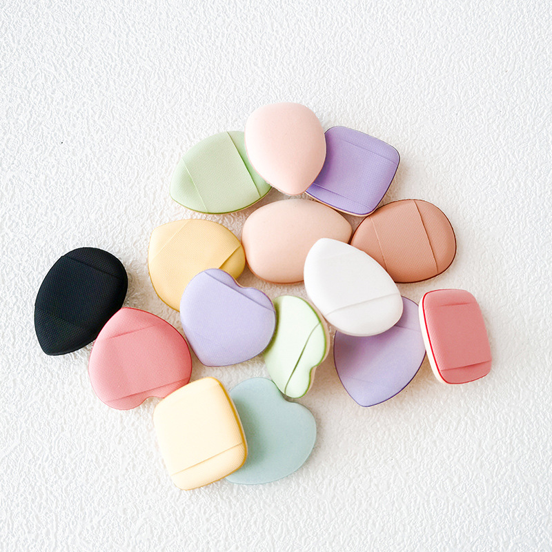 15/30/60/100 mini trikampių pirštų formos minkštų pudros tušinukų, kurie padidėja veikiami vandens, šlapių ir sausų makiažo įrankių
