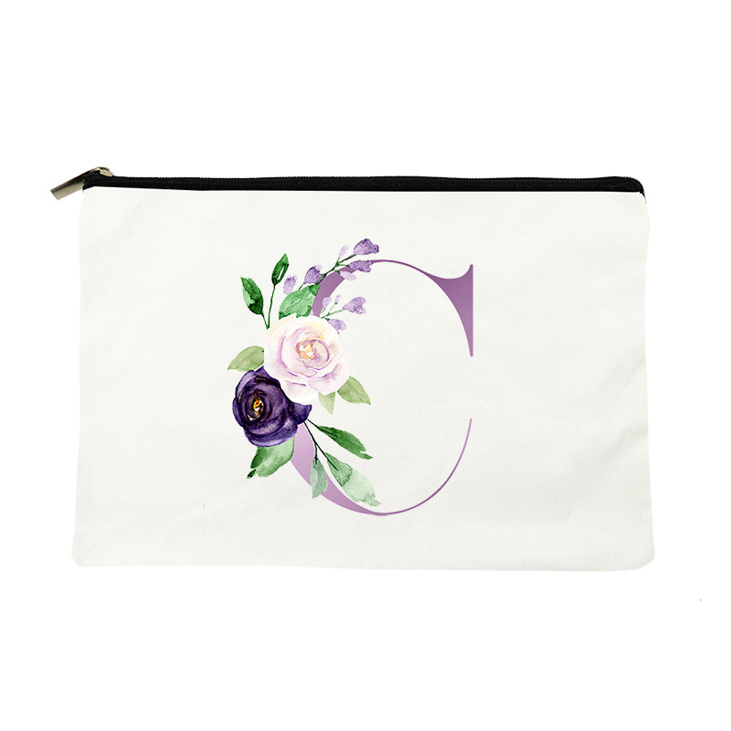 Paprasta violetinė kosmetinė su raidėmis, drobinė kosmetinė su daiktų laikymo rankena