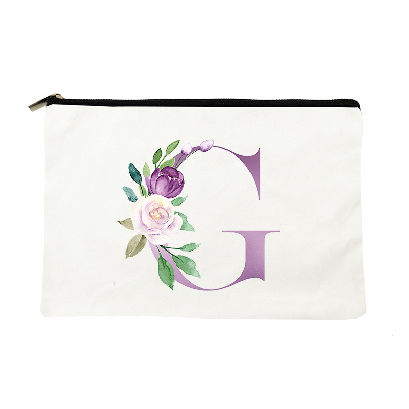 Paprasta violetinė kosmetinė su raidėmis, drobinė kosmetinė su daiktų laikymo rankena
