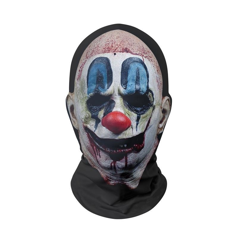 Piiriülene halloweeni jõulude ajal naljakas karnevali peakate, kuri verd sülitav klounimask, punase ninaga peakate