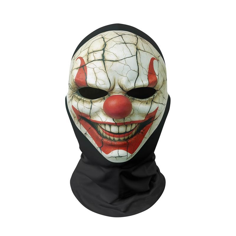 Piiriülene halloweeni jõulude ajal naljakas karnevali peakate, kuri verd sülitav klounimask, punase ninaga peakate