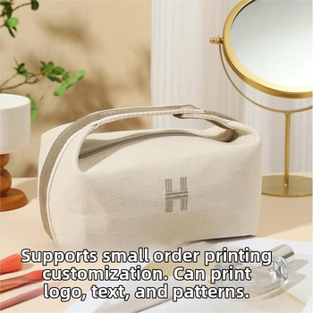 Kohandatud logoga lõuendikosmeetikakott, moodne õlakott, uhke ja suure mahutavusega reisitarvete kott