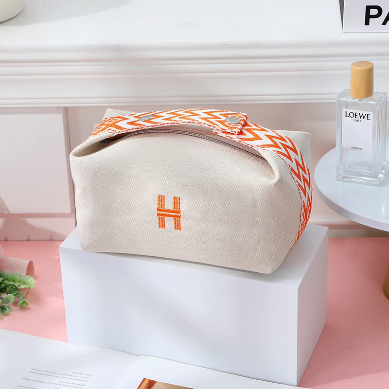 Kohandatud logoga lõuendikosmeetikakott, moodne õlakott, uhke ja suure mahutavusega reisitarvete kott