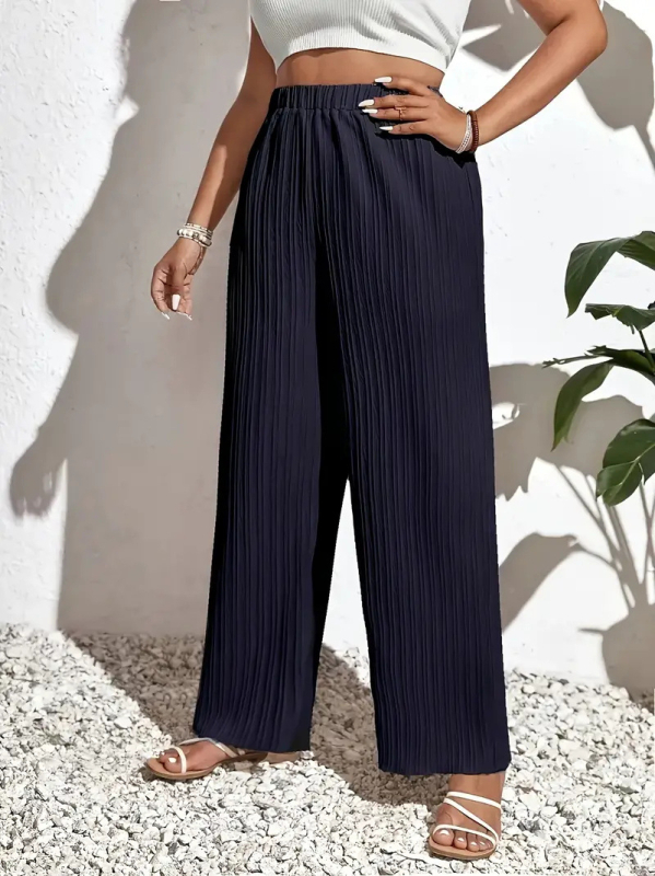 Elegáns, széles lábú nadrág elasztikus derekú, poliészter 95% feletti összetétel, tavasz 2024, munkahelyi megjelenés.