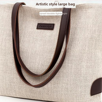 Kanvos audinio pečių rankinė su kaspinu ir kiškiuko mergaitės motyvu, su dugnu ir be šoninių sienelių, su logotipo spauda