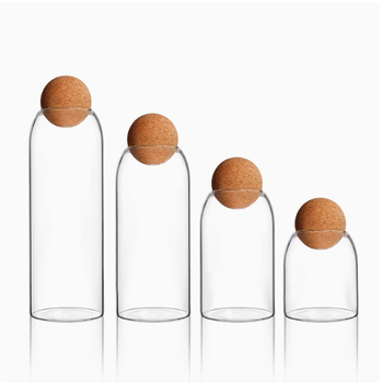 Stiklo laikymo indas su kamštiniu dangteliu, apvalios formos, iš borosilikatinio stiklo, teai ir kavos pupelėms