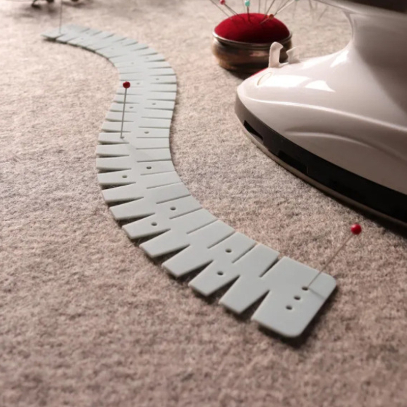 Silikonski lemovač – prijenosni šivaći alat, moderni minimalistički stil