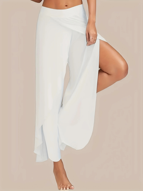 Moteriškos laisvos platėjančios kelnės su skeltu apatine, poliesteris, pagrindinis sudėtinių 30–50% poliesterio, juosmuo vidutinio aukščio, kelnių ilgis – ilgos