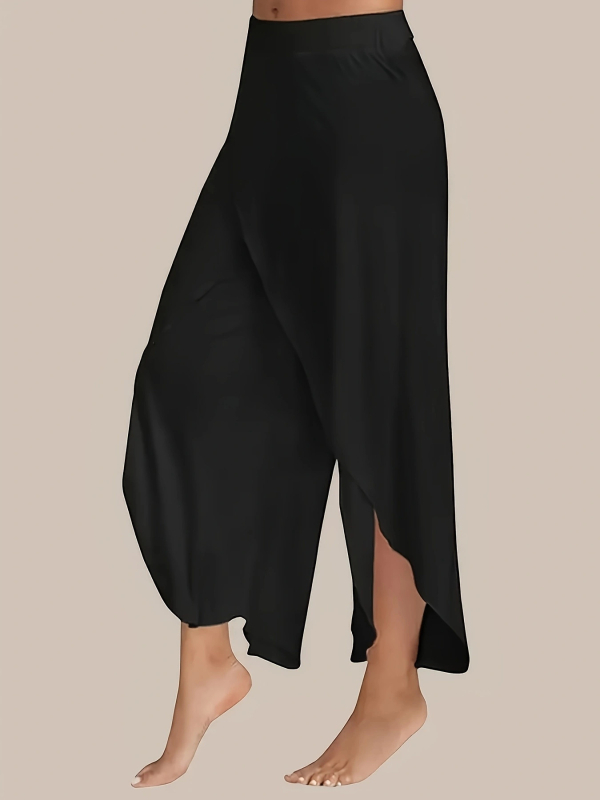 Moteriškos laisvos platėjančios kelnės su skeltu apatine, poliesteris, pagrindinis sudėtinių 30–50% poliesterio, juosmuo vidutinio aukščio, kelnių ilgis – ilgos